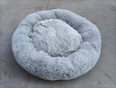Cozy memory foam dog bed with removable cover in soft gray faux fur design.